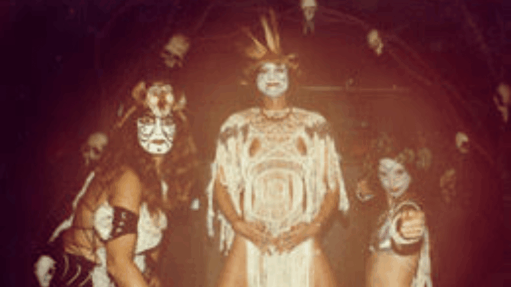 Three women in costume.